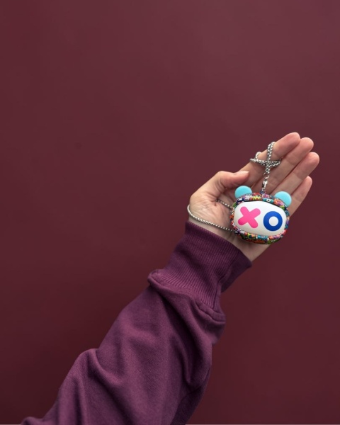 Kiddoboo GOAT Earbuds Graffiti słuchawki bezprzewodowe, mikrofon, lekkie, etui-wisiorek 9+